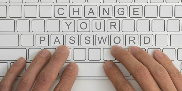 hands on a keyboard - change password
